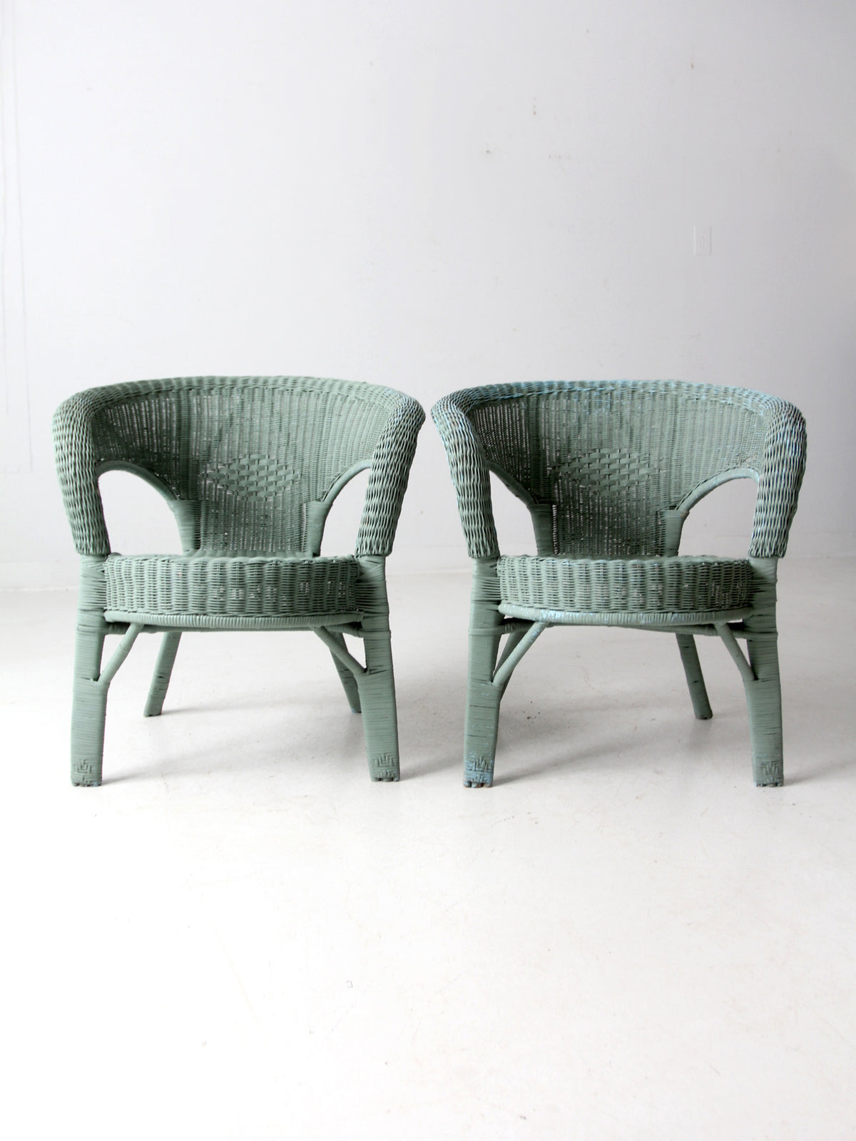 vintage painted wicker chair pair