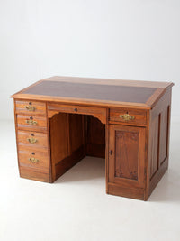 antique Victorian kneehole writing desk