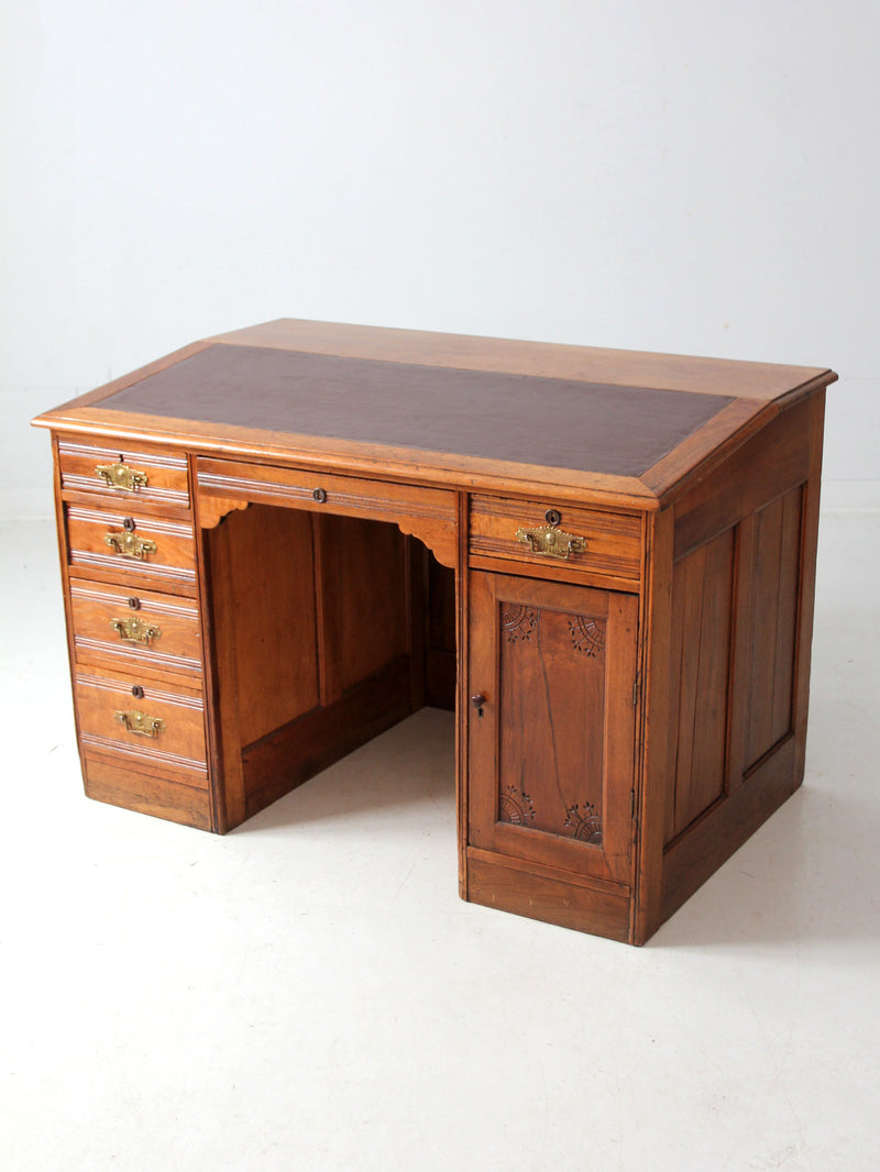 antique Victorian kneehole writing desk