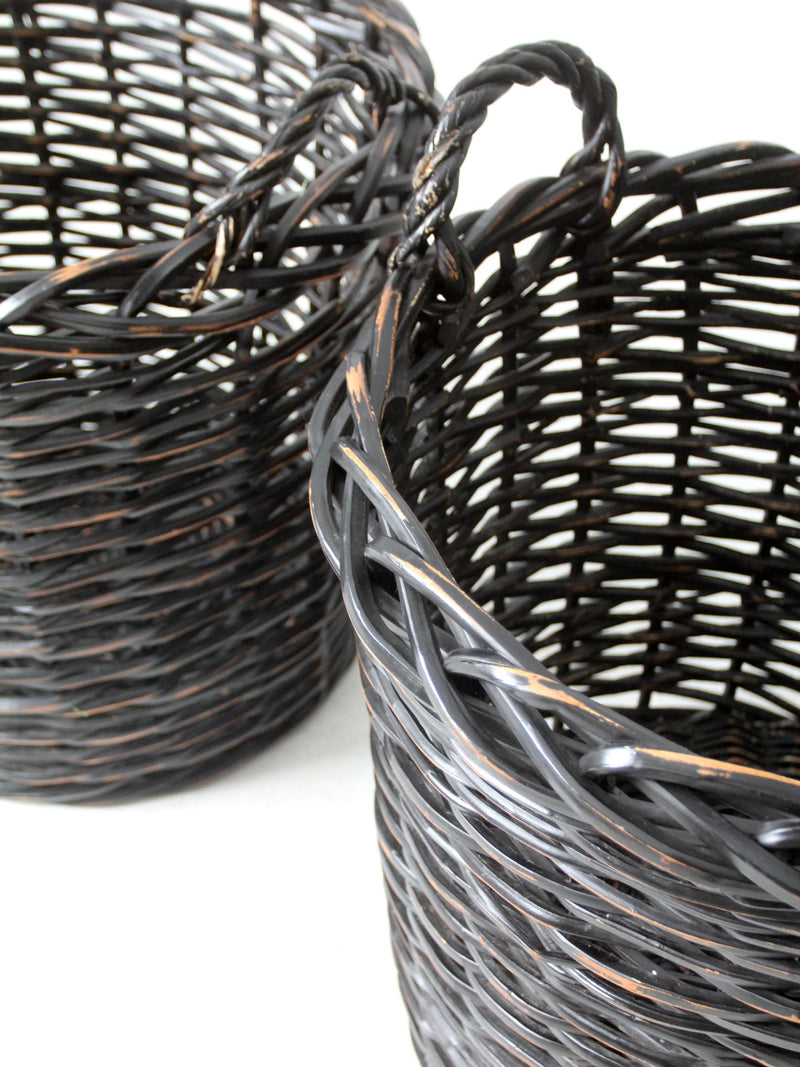 vintage black woven cane baskets pair