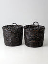 vintage black woven cane baskets pair