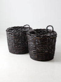 vintage black woven cane baskets pair