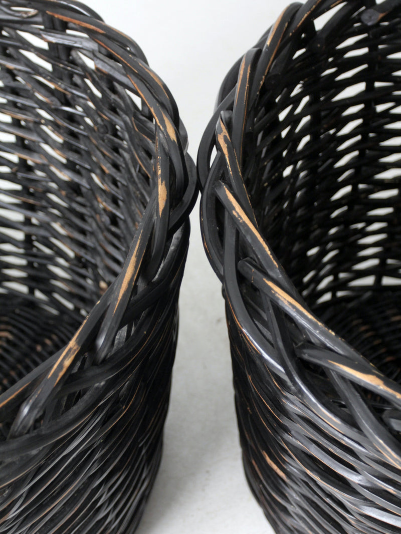 vintage black woven cane baskets pair