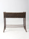 antique woven wicker planter stand