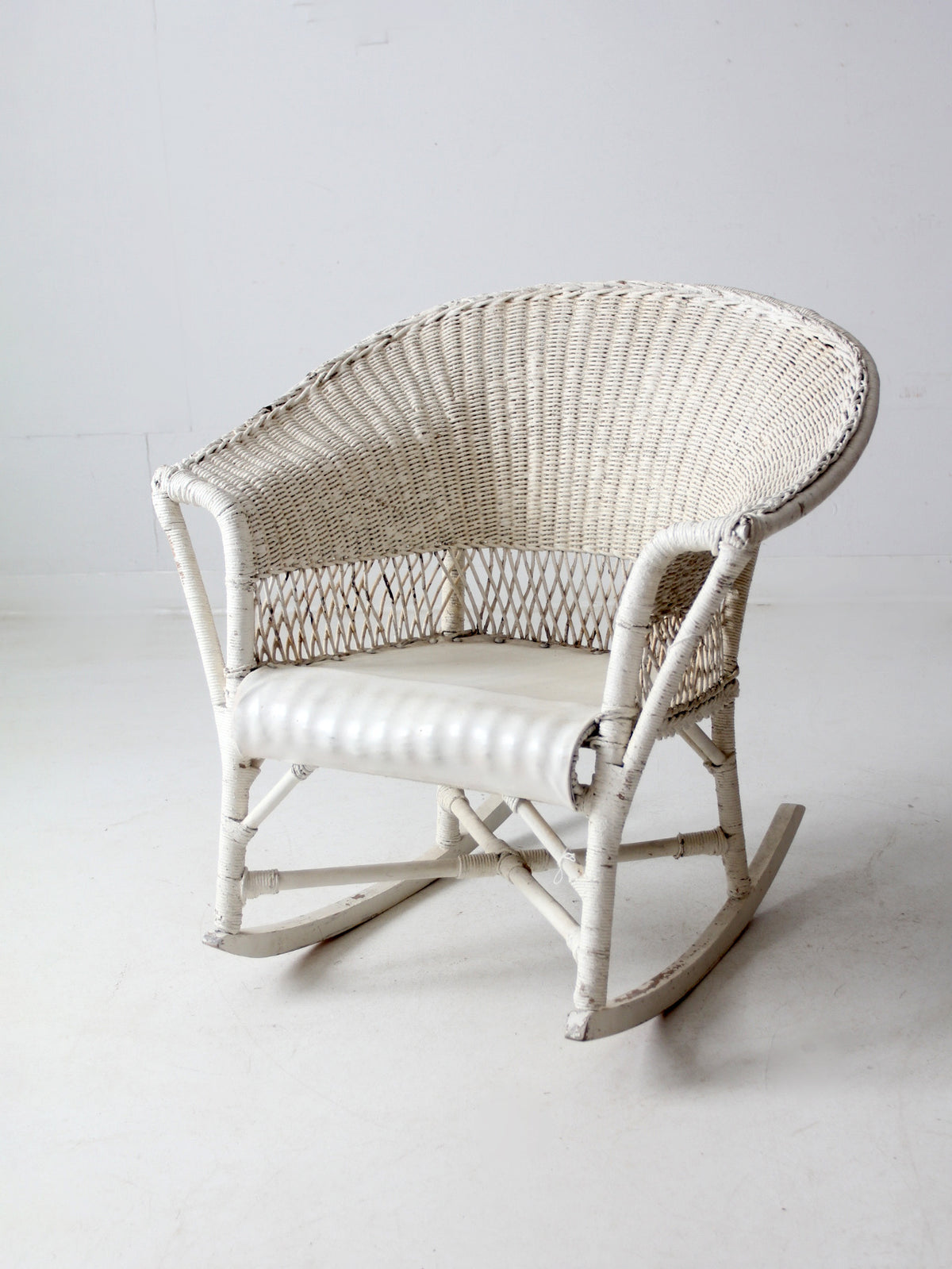 antique white wicker rocking  chair