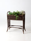 antique wicker woven planter stand