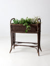 antique wicker woven planter stand