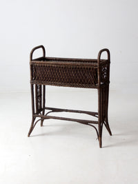 antique wicker woven planter stand