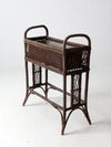 antique wicker woven planter stand