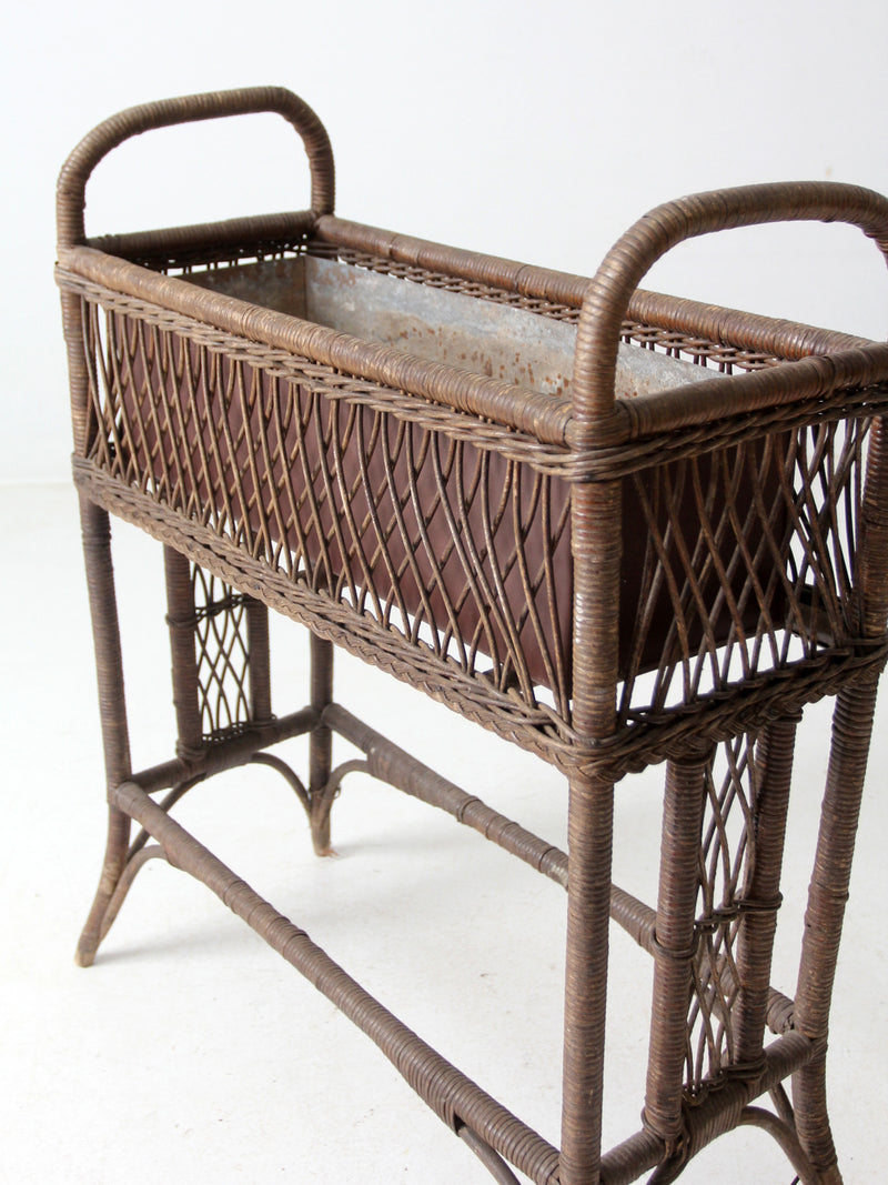 antique wicker woven planter stand