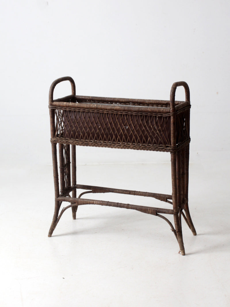 antique wicker woven planter stand