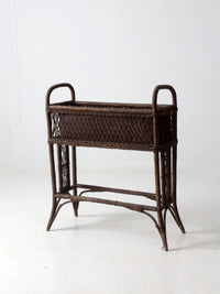 antique wicker woven planter stand