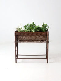 antique wicker planter stand