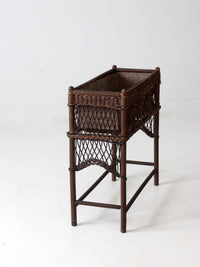 antique wicker planter stand