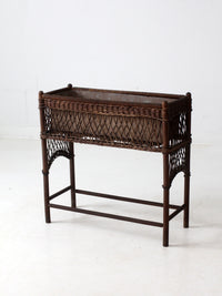 antique wicker planter stand