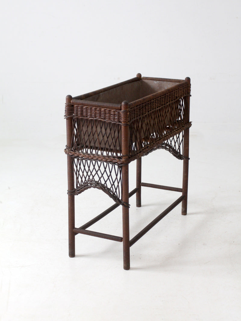 antique wicker planter stand