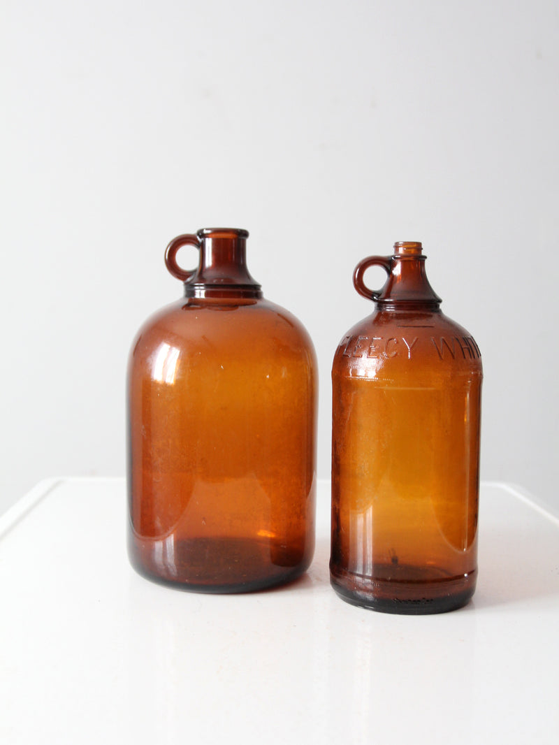 vintage brown glass bottle jugs pair