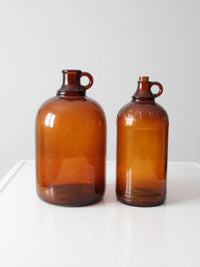 vintage brown glass bottle jugs pair