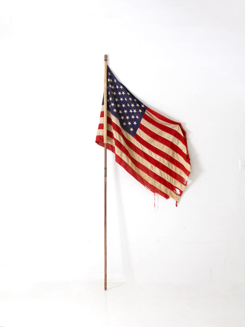 vintage 1960s American flag on pole