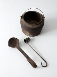 antique smelting pot and ladles