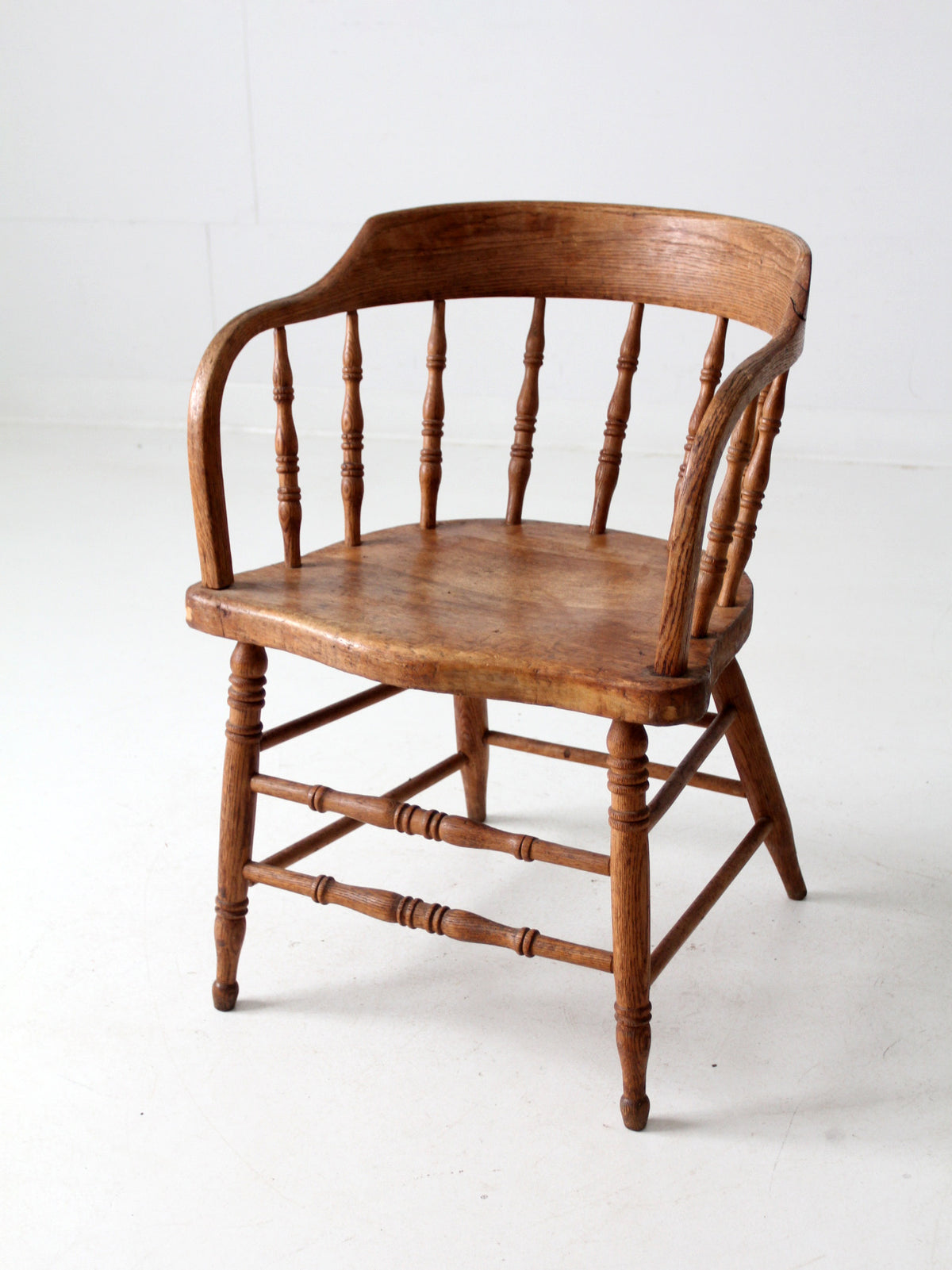 antique rustic captain's chair