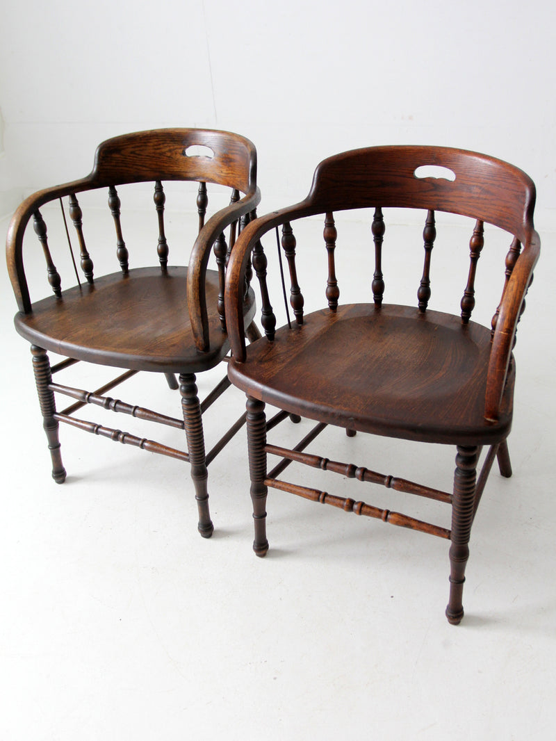 antique captains chair pair