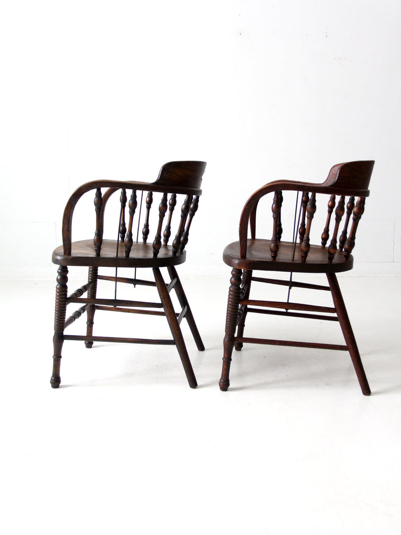 antique captains chair pair