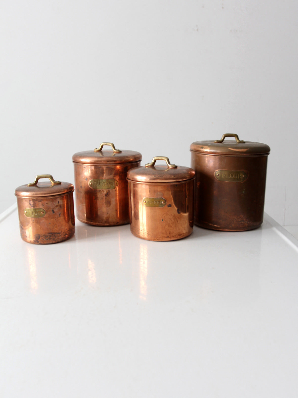 Antique 1920eaart retailer deco copper bott3msdrink gClaues,sset of four