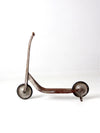 vintage toy scooter circa 1940s