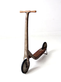 vintage toy scooter circa 1940s