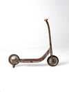 vintage toy scooter circa 1940s