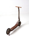 vintage toy scooter circa 1940s