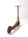 vintage toy scooter circa 1940s