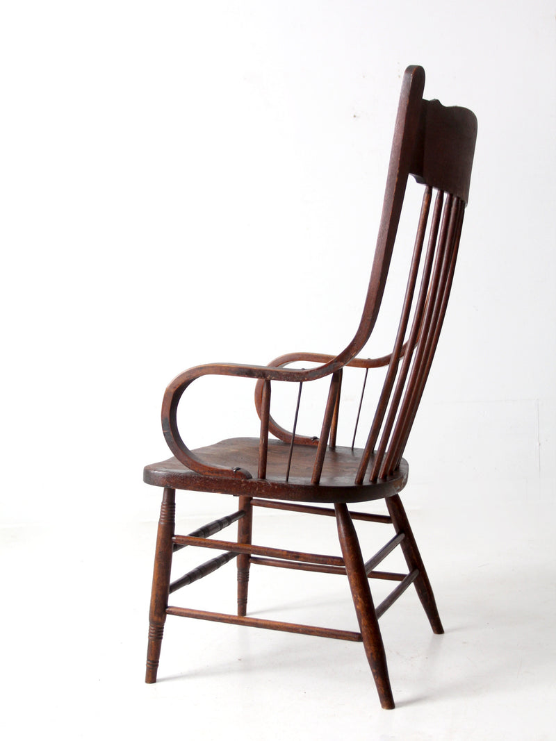 antique press back armchair