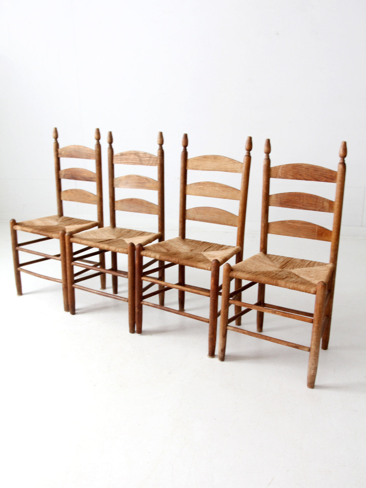 set of 4 ladder back chairs with woven seats