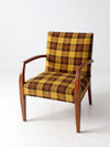 mid century lounge chair with plaid upholstery