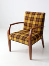 mid century lounge chair with plaid upholstery