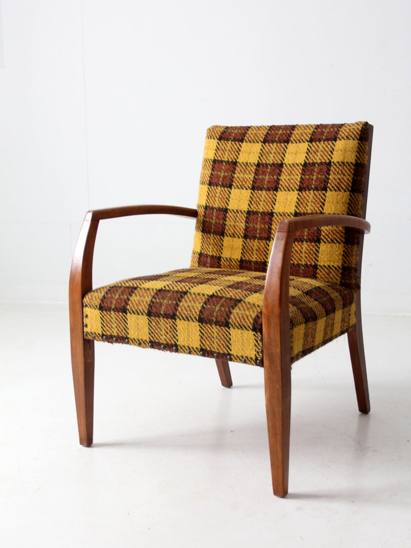 mid century lounge chair with plaid upholstery