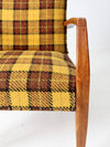 mid century lounge chair with plaid upholstery