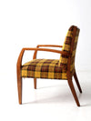 mid century lounge chair with plaid upholstery