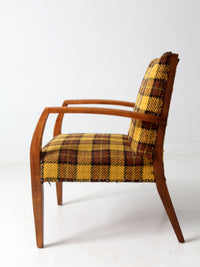 mid century lounge chair with plaid upholstery