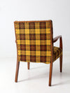 mid century lounge chair with plaid upholstery