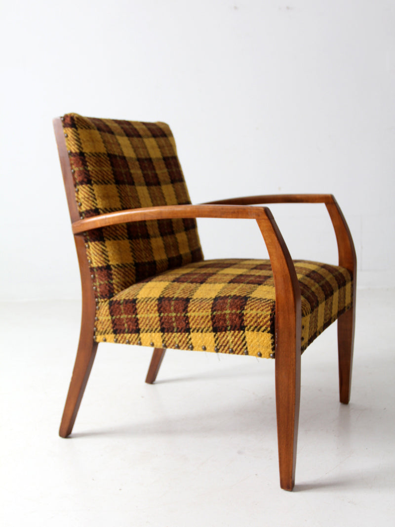 mid century lounge chair with plaid upholstery