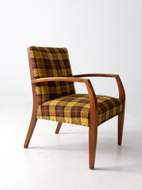 mid century lounge chair with plaid upholstery