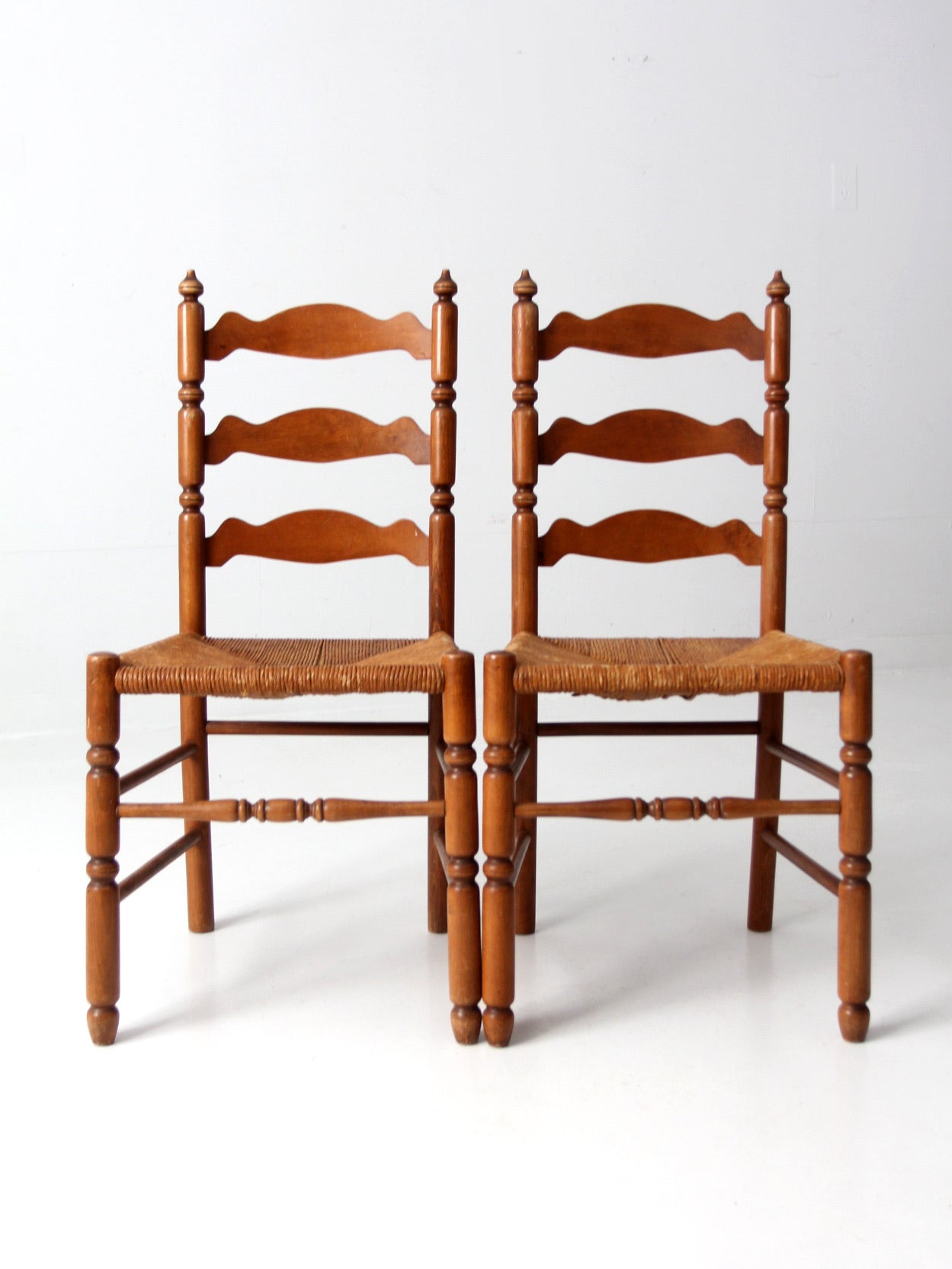 Antique ladder back outlet chairs with rush seats