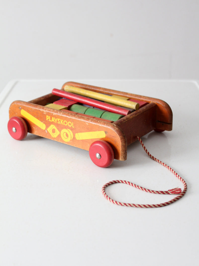 vintage 50s Playskool toy wagon with blocks