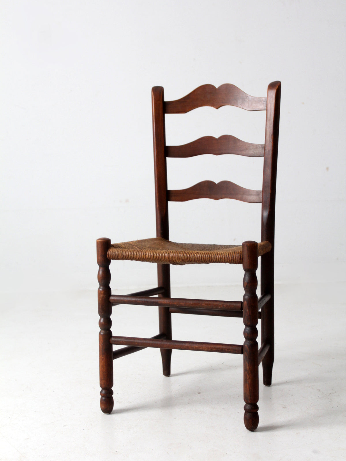 antique rush seat ladder back chair