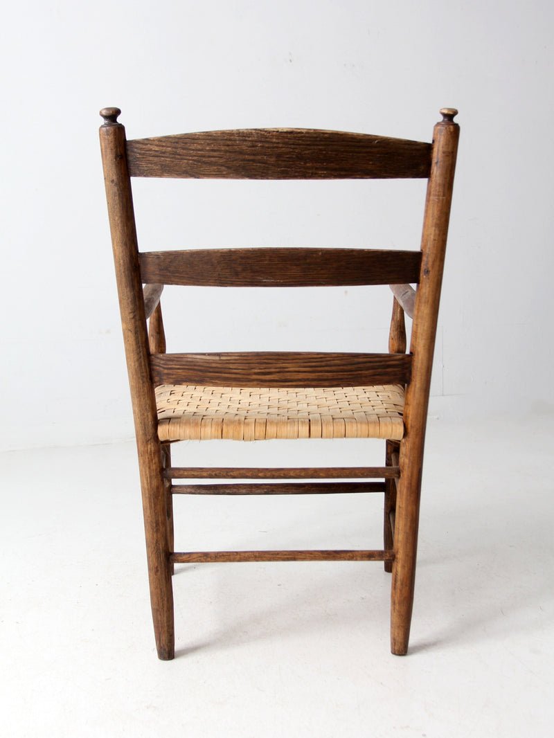 antique woven seat armchair