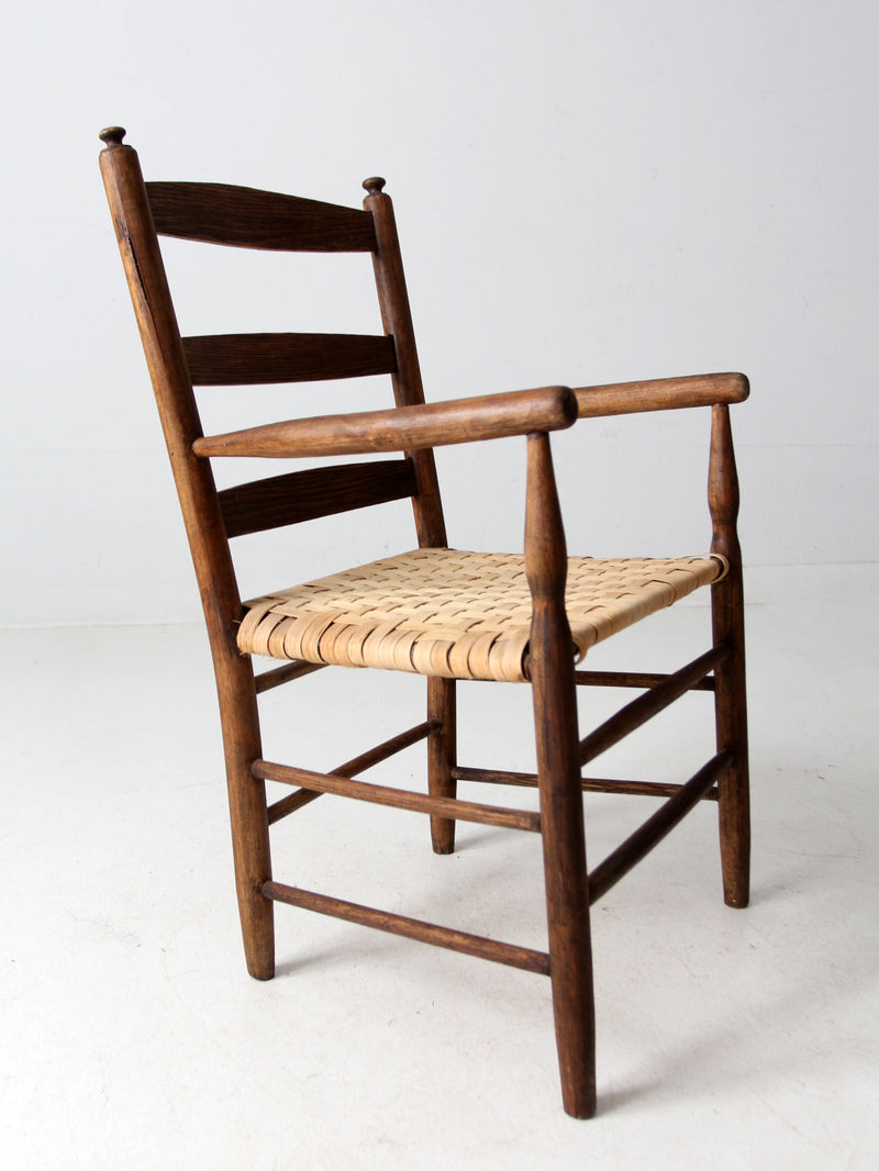 antique woven seat armchair