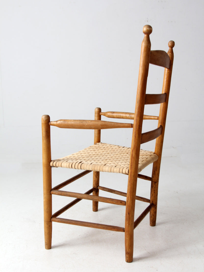 antique woven seat armchair